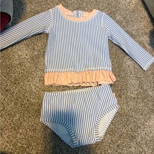 Ruffle Butts Blue & White Striped Rash Guard with Peach Ruffle